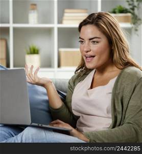 portrait woman home with laptop 2
