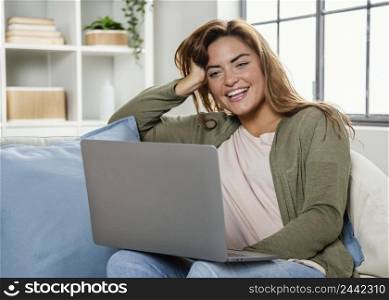 portrait woman home with laptop 3