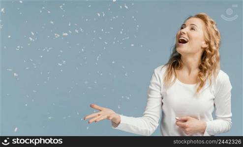 portrait woman laughing looking confetti