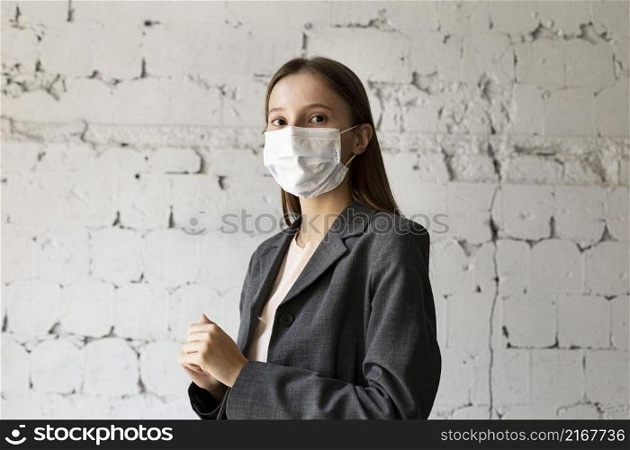 portrait woman office with face mask