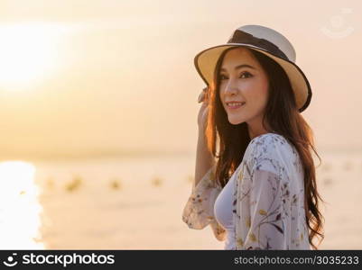 portrait woman on sea beach with sunset. portrait woman on the sea beach with sunset
