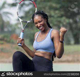 portrait woman playing tennis 2