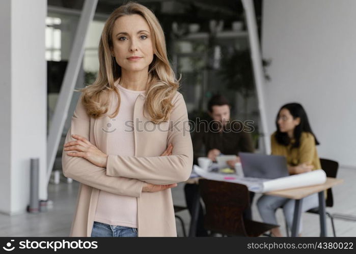 portrait woman posing her colleagues