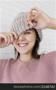 portrait woman wearing knitted cap
