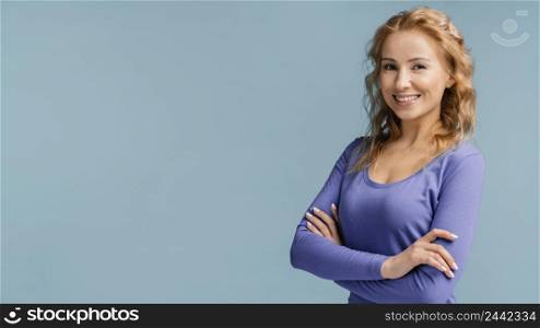 portrait woman with arms crossed laughing 2