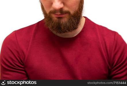 Portrait youn man with messy brown orange beard and moustache and messy hair. Bearded hipster with serious face on isolated white background with red shirt on. Barbershop. Beauty salon close-up beauty. Portrait youn man with messy brown orange beard and moustache and messy hair. Bearded hipster with serious face on isolated white background with red shirt on. Barbershop. Beauty salon close-up