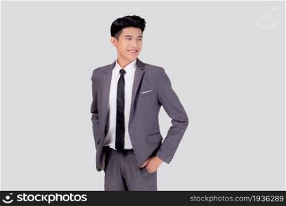 Portrait young asian businessman in suit with confident and friendly isolated on white background, business man smart with success hand in pocket, manager or executive with handsome and leadership.