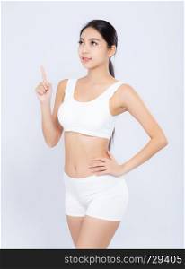 Portrait young asian woman smiling beautiful body diet with fit and finger pointing something isolated on white background, model girl weight slim with cellulite or calories, health and wellness concept.