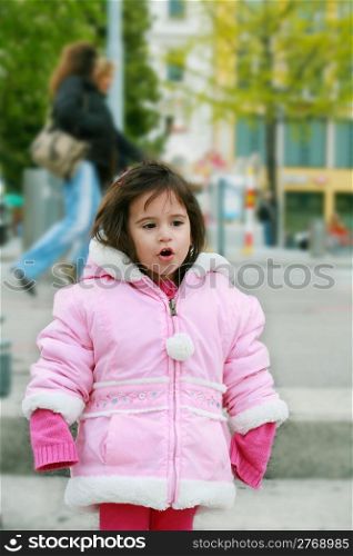 portrait young girl walking in winter park