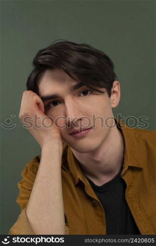 portrait young man wearing shirt posing