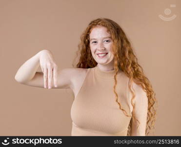 portrait young woman teaching sign language