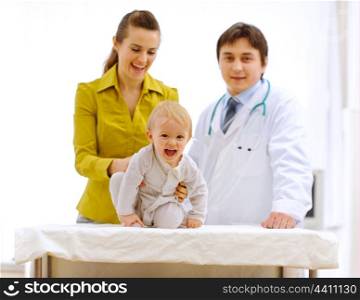 Portraits of mother, baby and pediatric doctor &#xA;