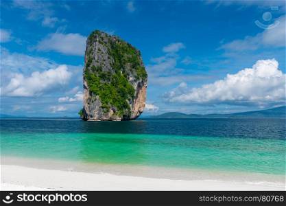 portrays a landscape with a beautiful rock and clear sea, Poa Island, Thailand