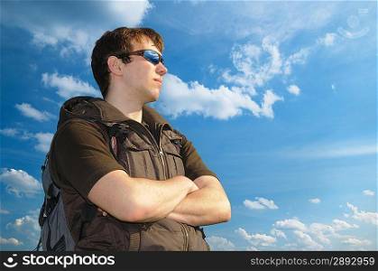porttain on young man on blue sky