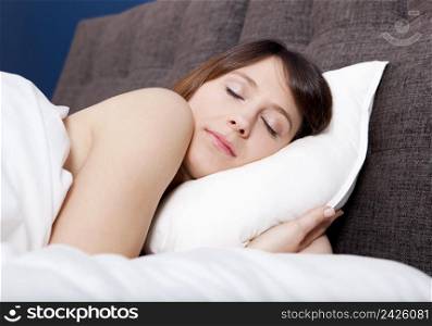 Porttrait of a beautiful young woman sleeping