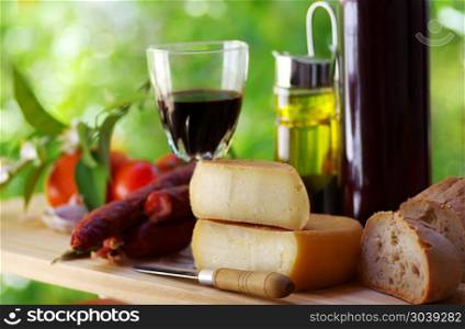 portuguese bread, cheese an red wine