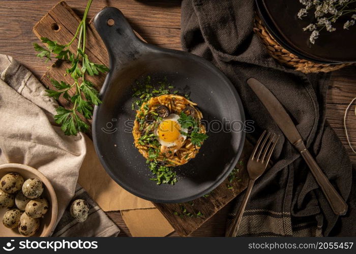 Portuguese cuisine - Frango a Bras. Traditional Portuguese dishes, based on sauteed chicken with onion, garlic, parsley, olives, egg and potatoes chips. A variation of the traditional Bras cod dish