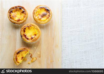 Portuguese Egg Tarts, is a kind of custard tart found in various Asian countries. The dish consists of an outer pastry crust and is filled with egg custard and baked.