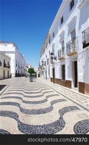 Portuguese sidewalk in square of Olivenza city, Spain