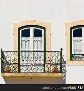 Portuguese Windows with a Balcony