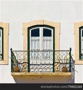 Portuguese Windows with a Balcony