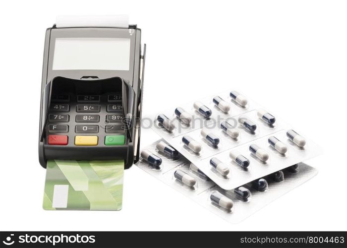 POS terminal, debit card and pill blister packs over white