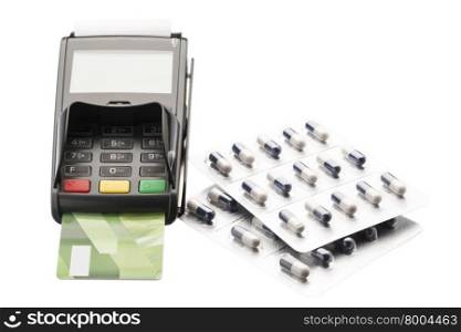 POS terminal, debit card and pill blister packs over white