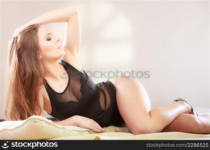 Posing girl with shapely hips. Putting the hand up.. Posing girl with shapely hips.