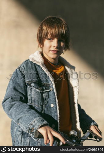 posing outdoors city while riding his bike