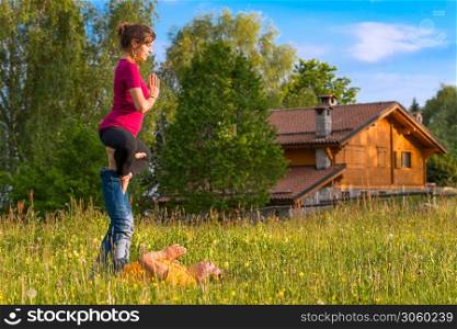 Positions Acroyoga girl of male in nature in the mountains