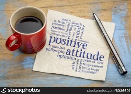 positive attitude word cloud - handwriting on a napkin with a cup of coffee