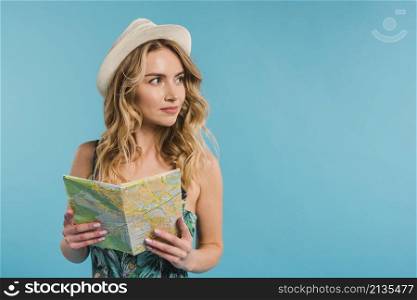 positive attractive young woman hat dress holding map