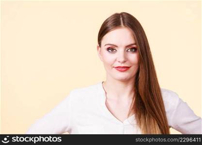 Positive emotions, natural beauty, face expressions concept. Attractive happy smiling woman in brown hair and full makeup. Smiling attractive woman with full makeup