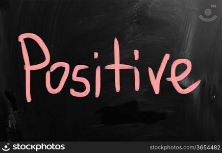 ""positive" handwritten with white chalk on a blackboard"