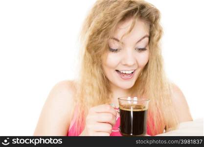 Positive woman holding black coffee about to drink. Getting morning energy, isolated. Positive woman drinking her morning coffee