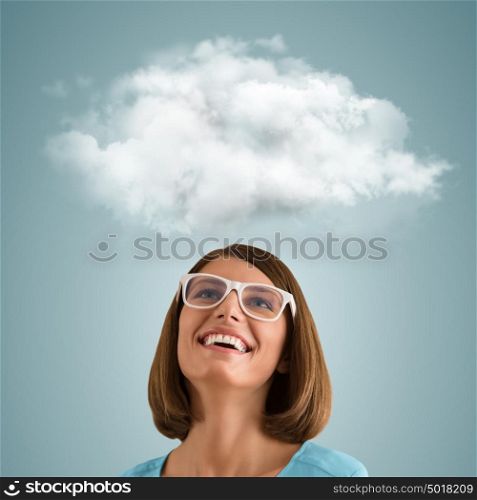 Positive woman looking at white cloud