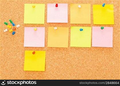 Post-it reminder sticker note with pins on board