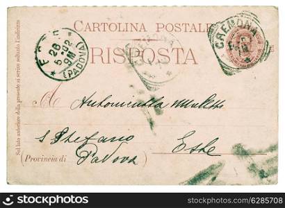 postcard. old used italian handwritten letter with typical for this time stamps and paper texture. text unreadable