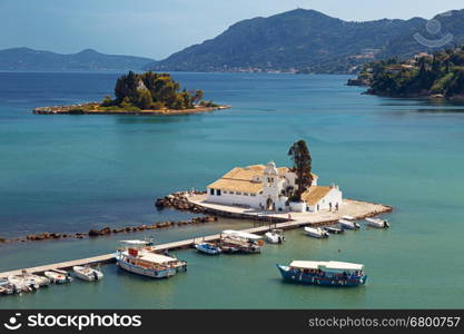 Postcard view of Vlacherna Monastery and Mouse island on Corfu, Greece. Probably the most iconic and well known corfiot landmarks.