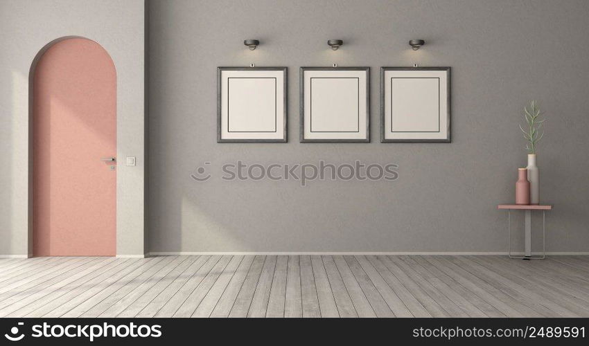 Poster mockup in a empty room with pink arched door and gray walls - 3d rendering. Poster mockup in a empty room with frameless arched door