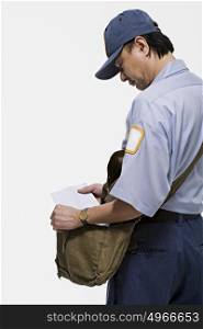 Postman holding a letter