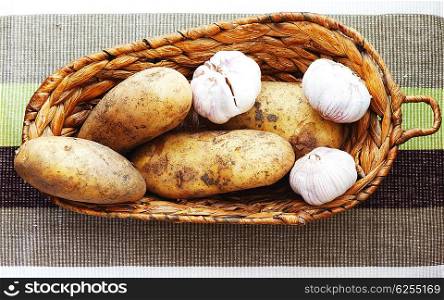 Potato and garlic in the basket