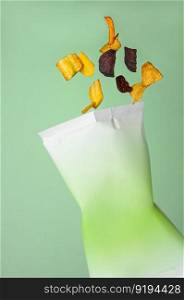 potato chips fall in a bag, float in the air, mid-air. package with chips