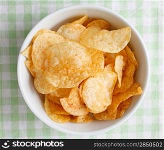 Potato chips in a bowl outside