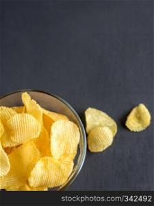 Potato chips in the glass bowl