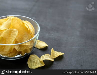 Potato chips in the glass bowl