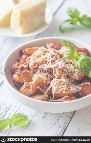 Potato gnocchi with tomato sauce and grated cheese