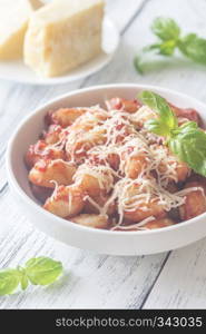 Potato gnocchi with tomato sauce and grated cheese