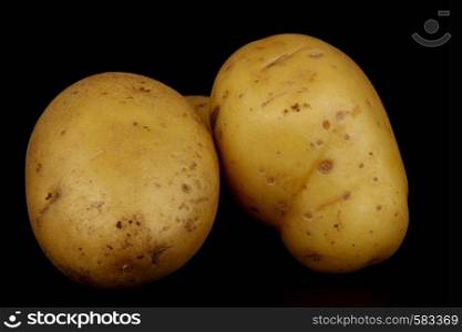 potato isolated on black
