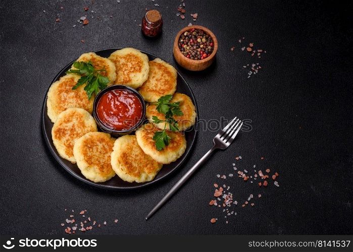 Potato Pancakes. Vegetable fritters. Latkes in frying pan. Potato Cakes. Vegetable fritters, latkes, hash browns. Vegetable pancakes